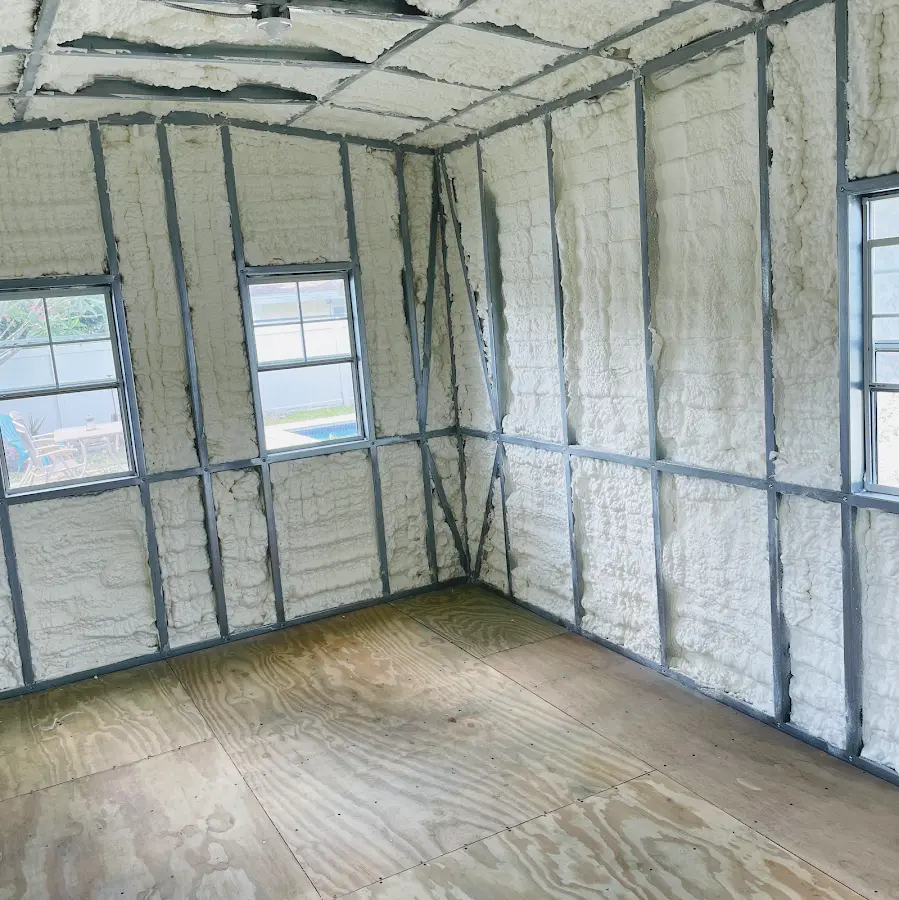 Closed-cell spray foam insulation applied to wall cavities in a residential project in Hercules